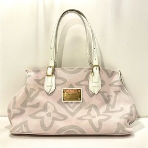 Authentic Louis Vuitton Pink Tahitienne Cabas Rose Blanco PM tote bag.